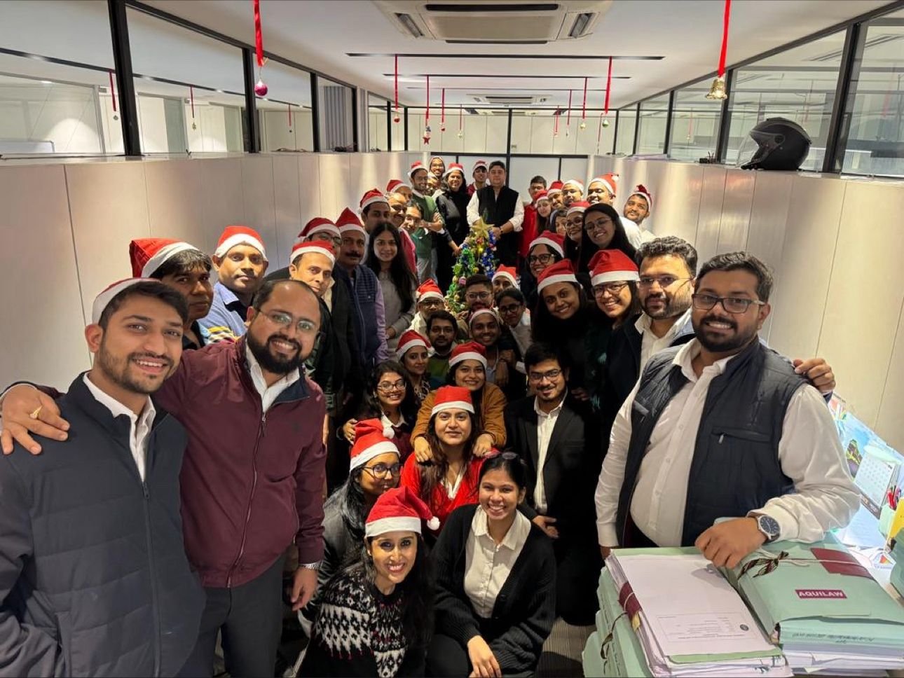 Christmas at AQUILAW has become a tradition of joy, collegiality, camaraderie, fun music, great food & the best Secret Santa !